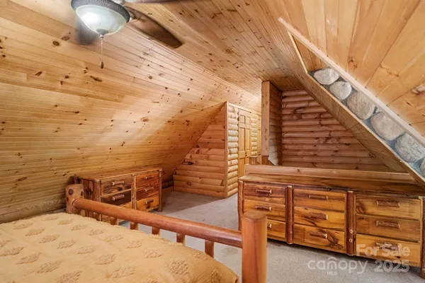 a view of storage and utility room with washer and dryer