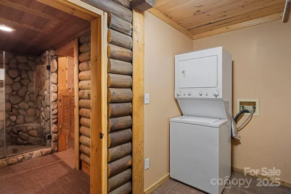 a view of entryway with a door and wooden door