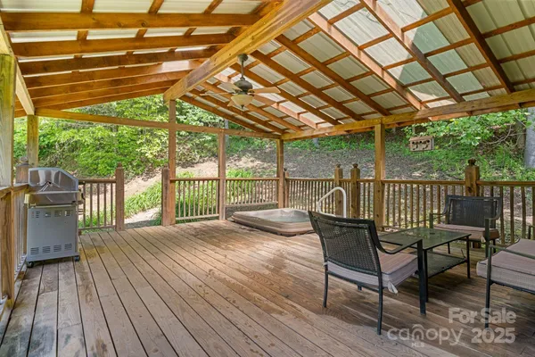 a view of a chairs on the deck