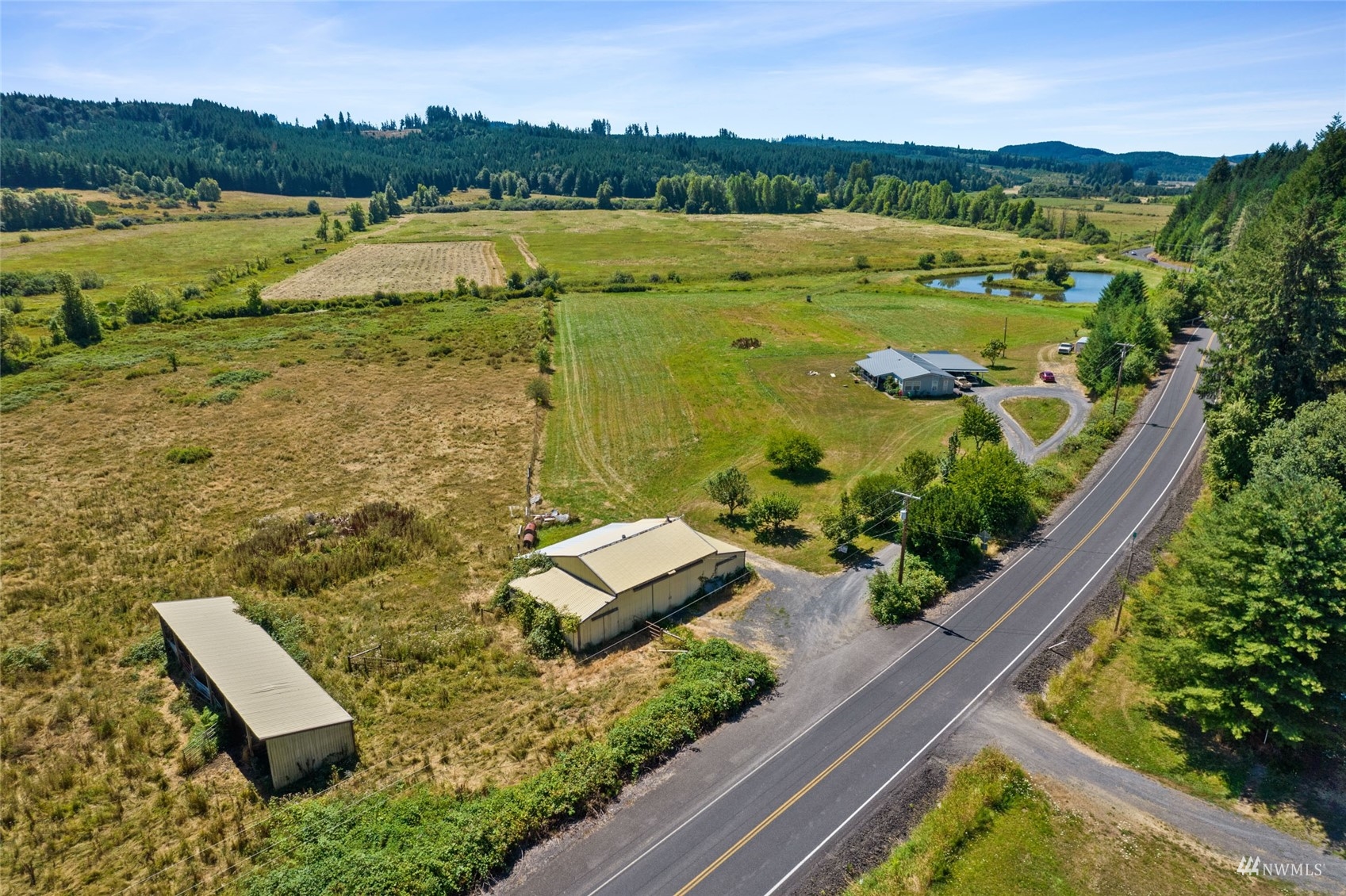 1503 Lincoln Creek Road Rochester, WA 98579 - Photo 1 of 28 a view of a lake with a mountain