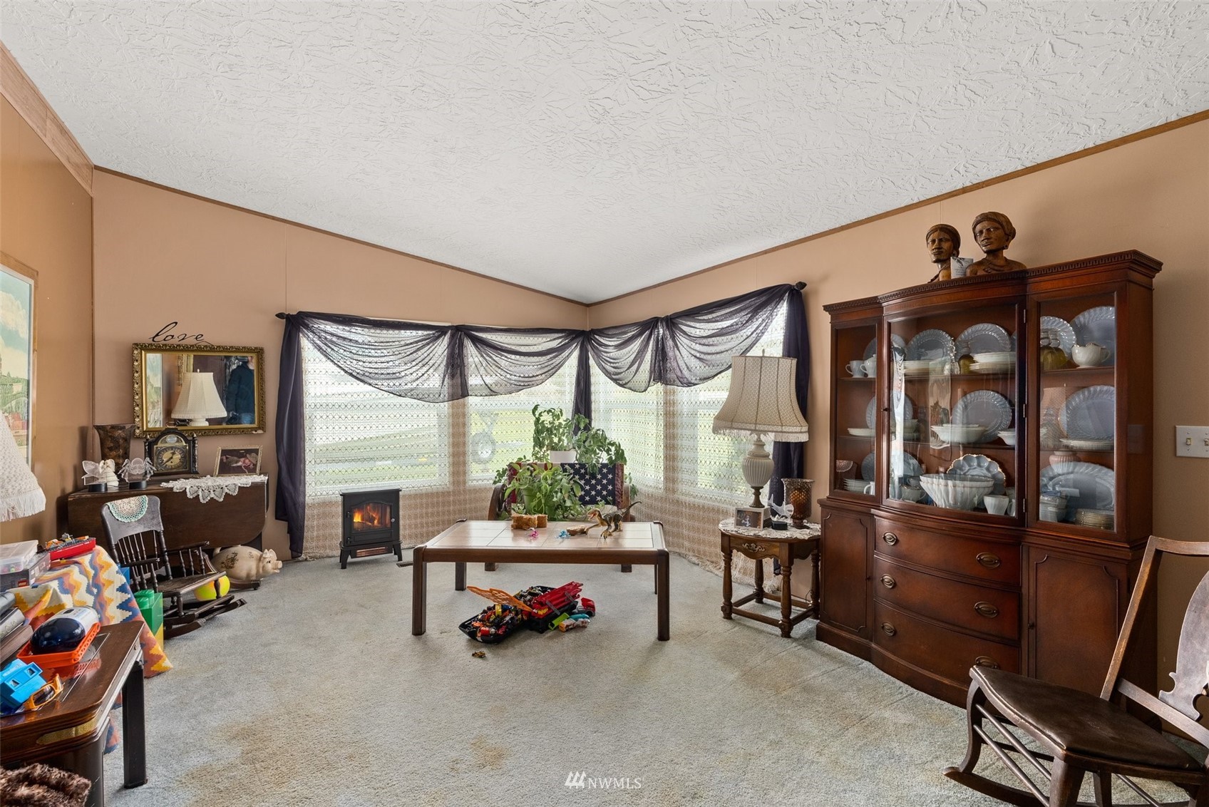 1503 Lincoln Creek Road Rochester, WA 98579 - Photo 12 of 28 a reading room with furniture and a large window