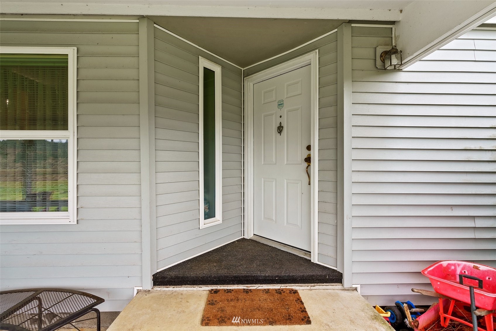 1503 Lincoln Creek Road Rochester, WA 98579 - Photo 14 of 28 a view of a house with a door and a window