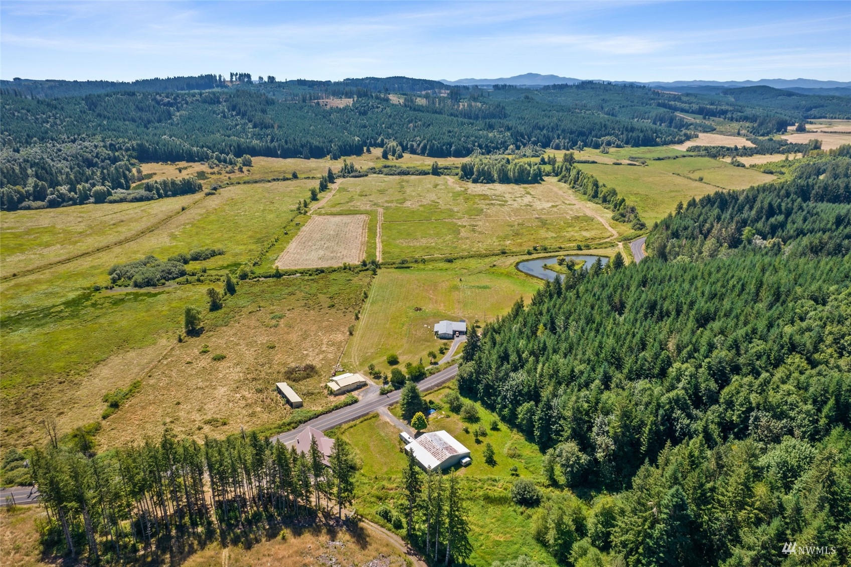 1503 Lincoln Creek Road Rochester, WA 98579 - Photo 2 of 28 an aerial view of residential houses with outdoor space