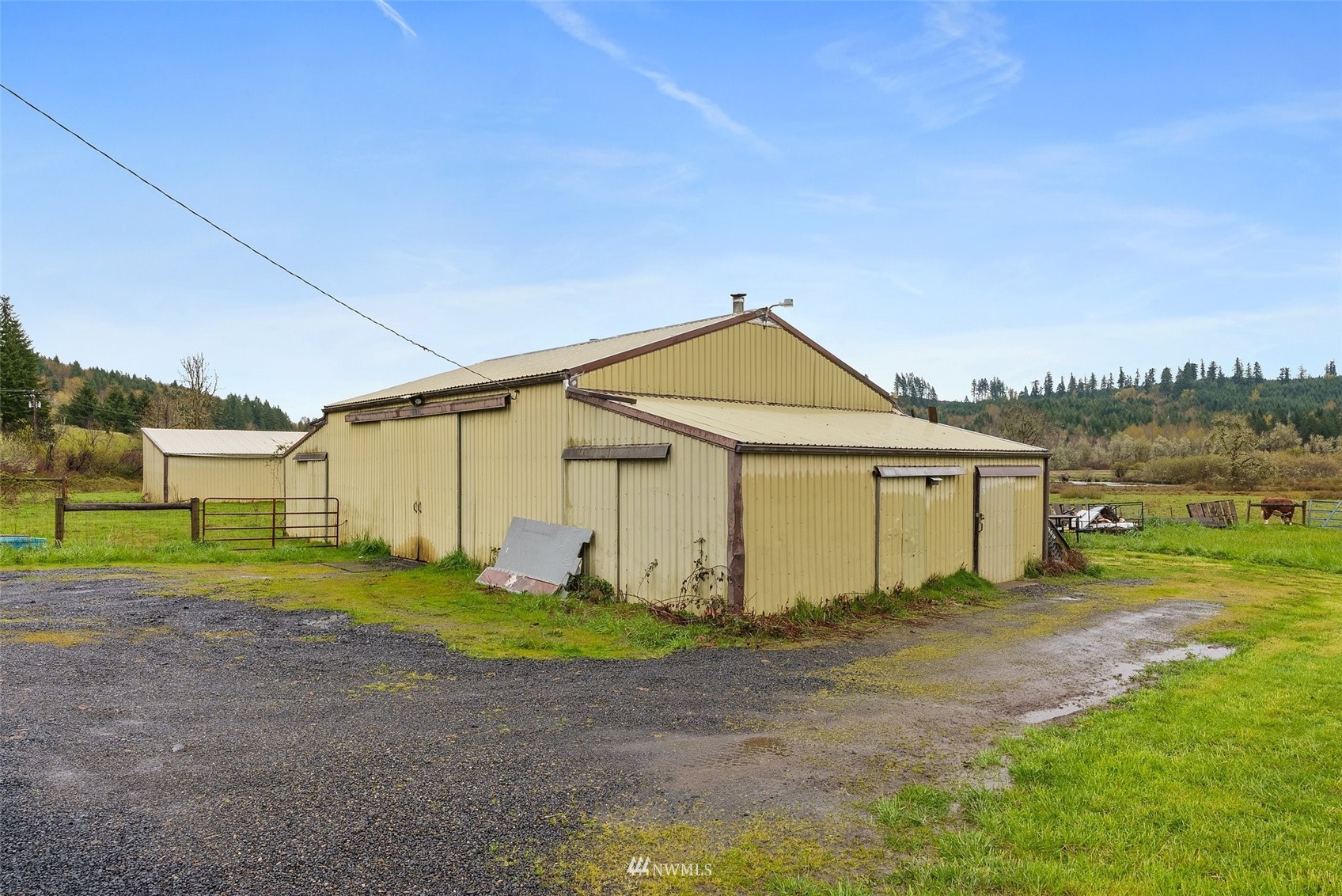 1503 Lincoln Creek Road Rochester, WA 98579 - Photo 22 of 28 a view of a house with a yard