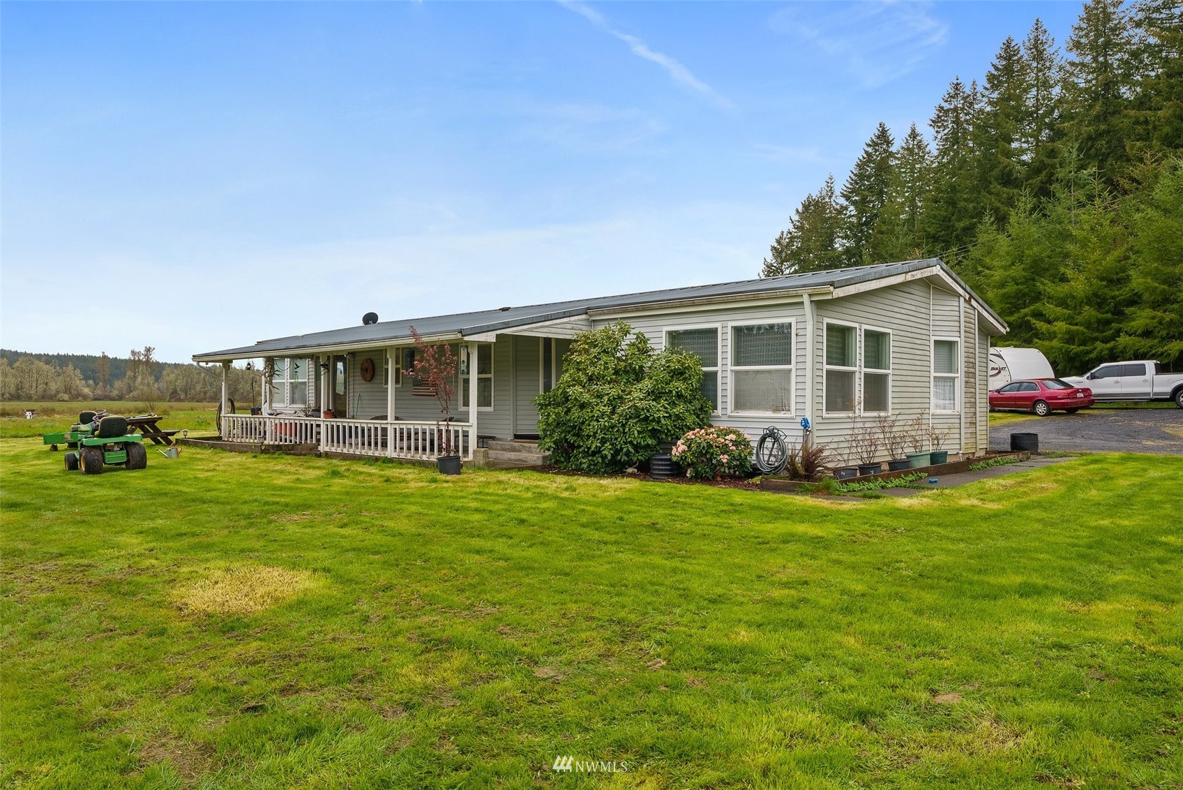 1503 Lincoln Creek Road Rochester, WA 98579 - Photo 9 of 28 a view of a house with a backyard