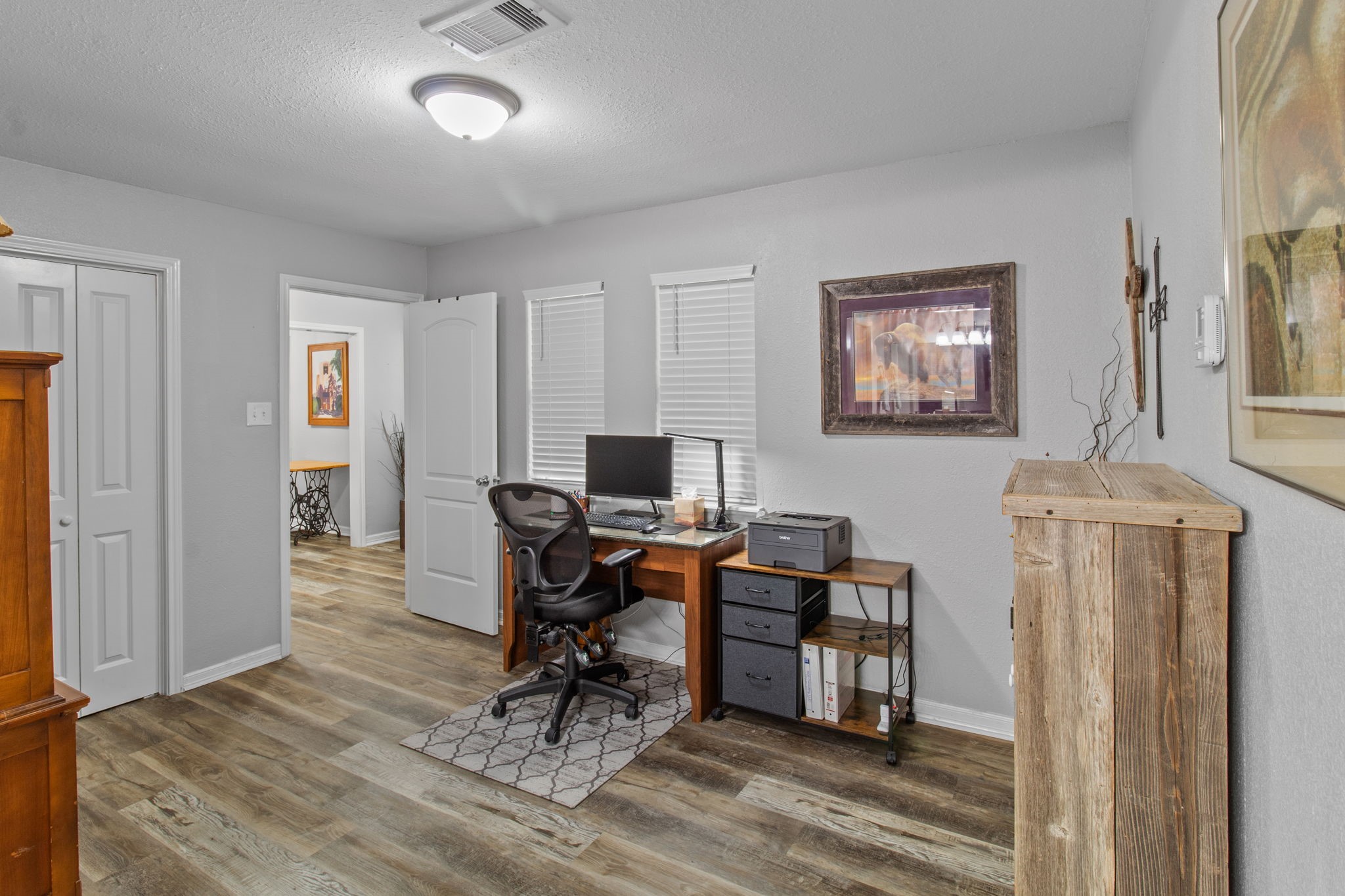 21 Red Oak Circle Point Blank, TX 77364 - Photo 27 of 50 a view of a workspace with furniture and a window