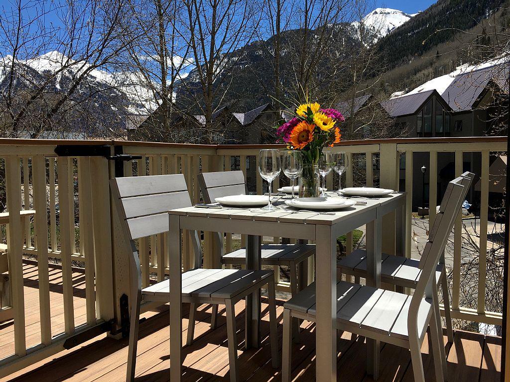 a view of an chairs and tables in the patio