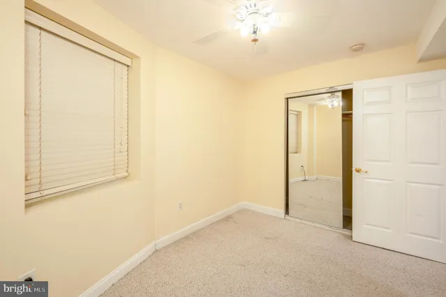 a view of a backyard with pathway