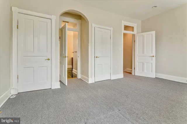 a view of empty room with closet area