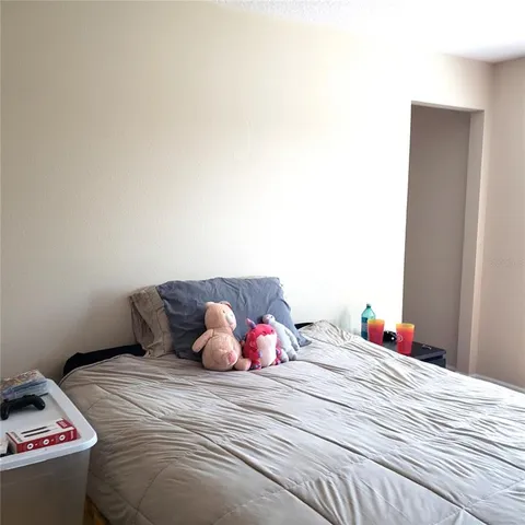 a bathroom with a shower and toilet