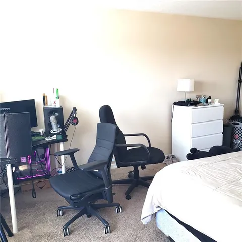 a bathroom with a bathtub and a sink