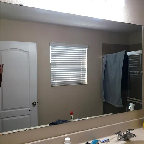 a view of a room that has a window in it