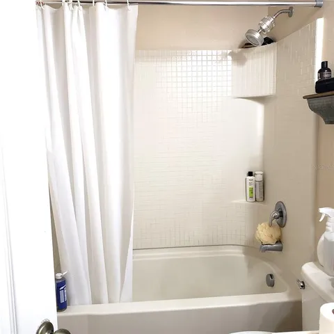 a view of workspace with a couch