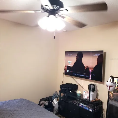 a view of backyard with small cabin