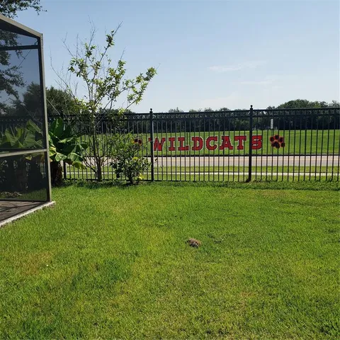 a childrens park with lots of swings and slides