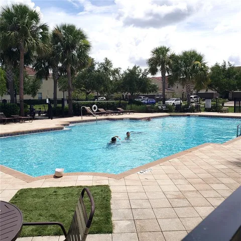 a view of a garden and basketball court