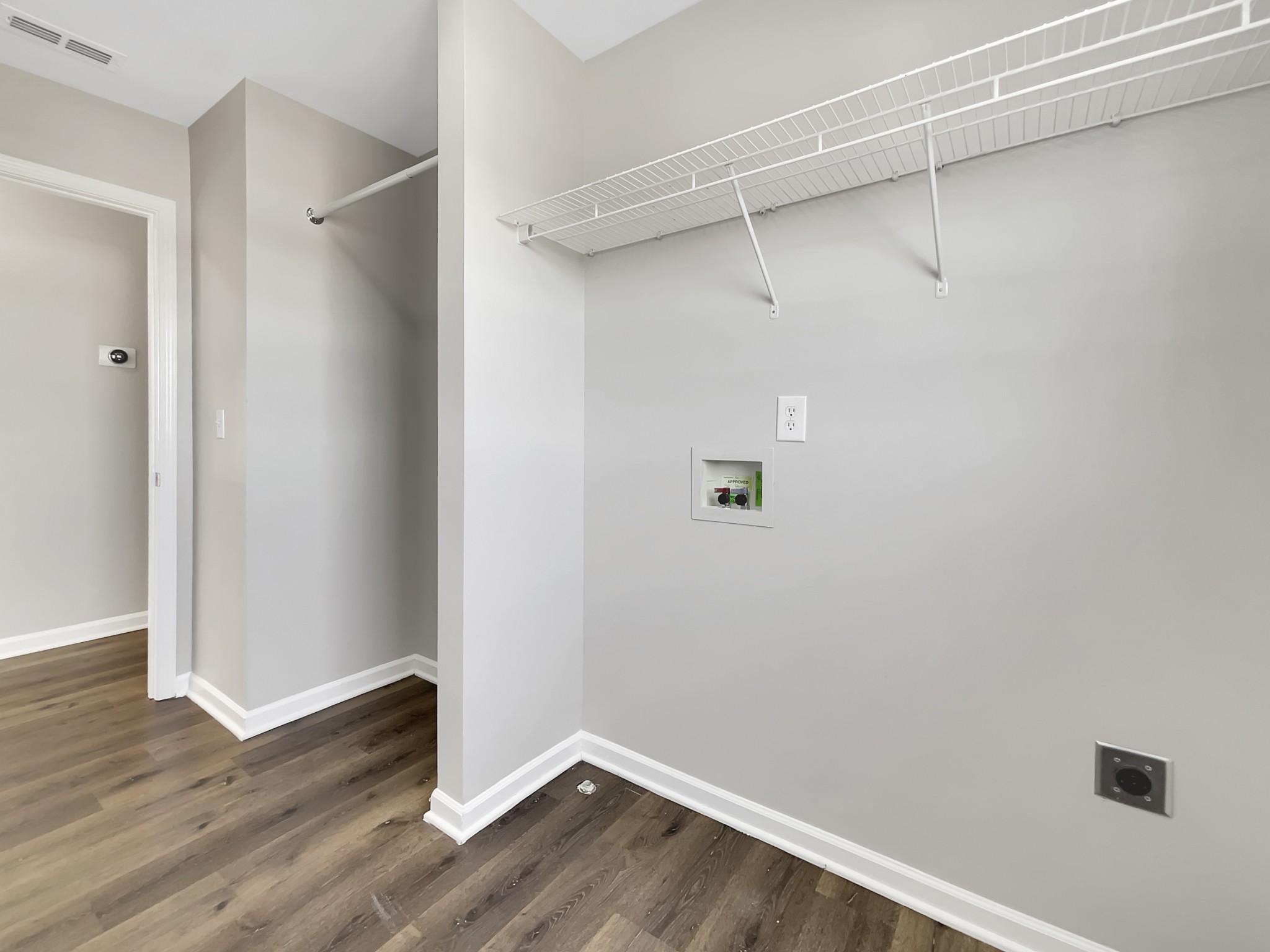 2033 Red Jacket Trace Spring Hill, TN 37174 - Photo 14 of 20 a view of a room with wooden floor