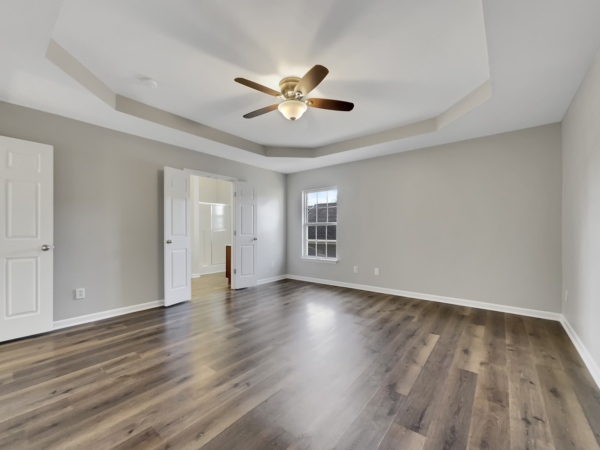 2033 Red Jacket Trace Spring Hill, TN 37174 - Photo 16 of 20 a view of empty room with wooden floor and fan