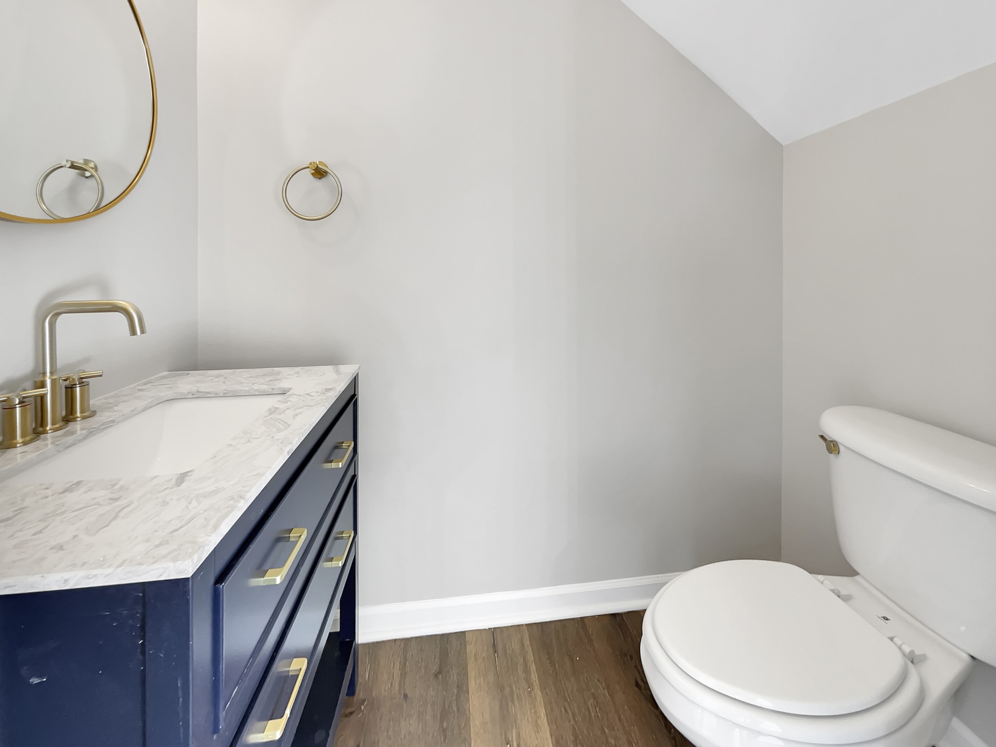 2033 Red Jacket Trace Spring Hill, TN 37174 - Photo 19 of 20 a bathroom with a sink a toilet and mirror