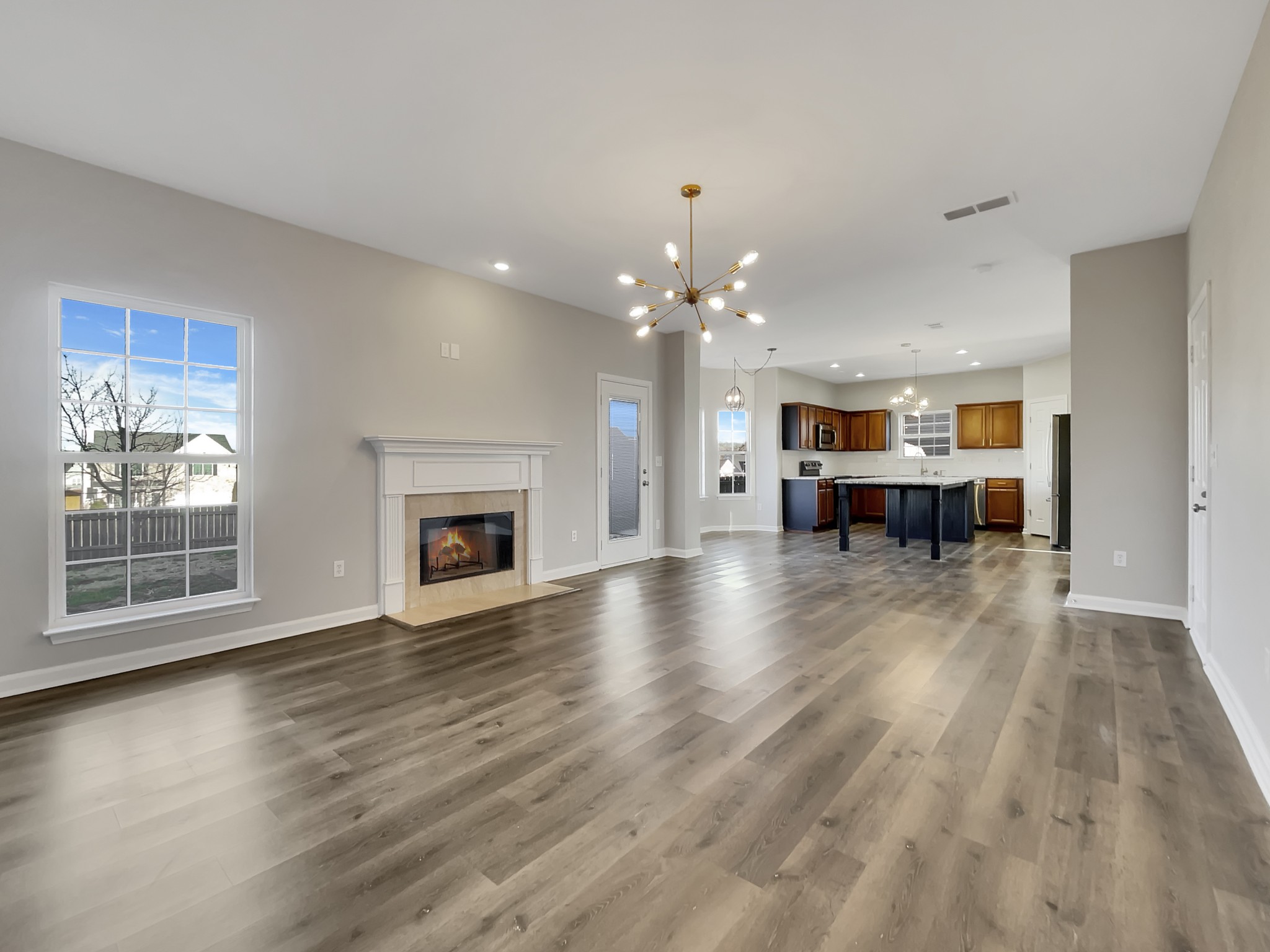 2033 Red Jacket Trace Spring Hill, TN 37174 - Photo 10 of 20 a view of livingroom with furniture and fireplace