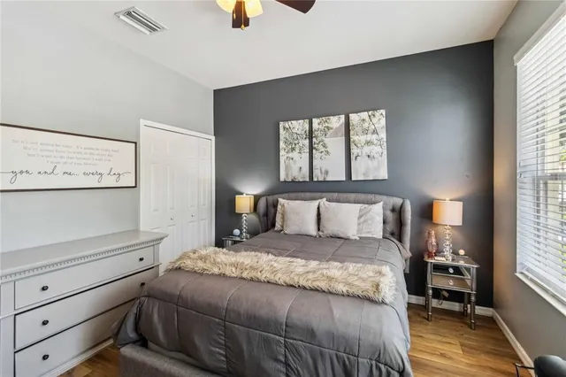 a bathroom with a sink toilet and mirror