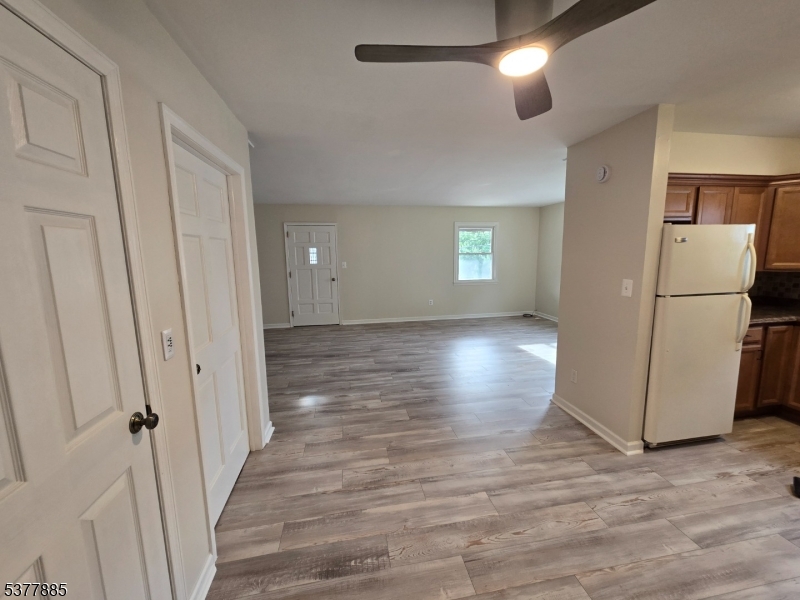 759 Lafayette Avenue, Unit 2 Hawthorne, NJ 07506 - Photo 4 of 13 a view of empty room with wooden floor