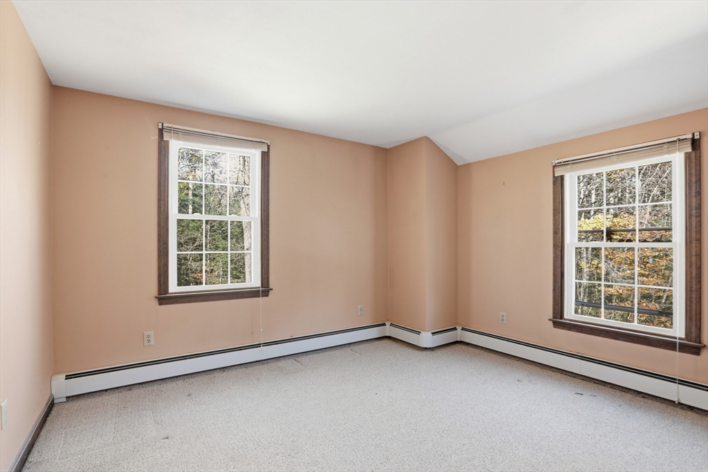 254 Ash Swamp Road Newmarket, NH 03857 - Photo 13 of 30 an empty room with a window