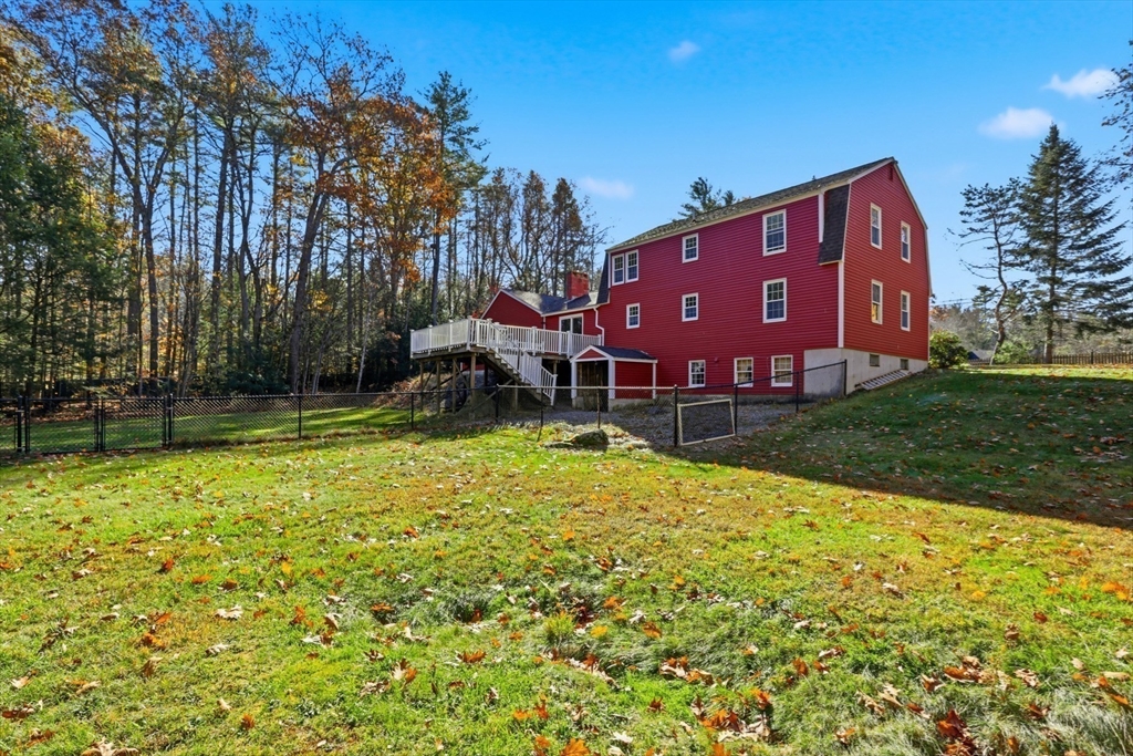 254 Ash Swamp Road Newmarket, NH 03857 - Photo 20 of 30 a house view with a garden space