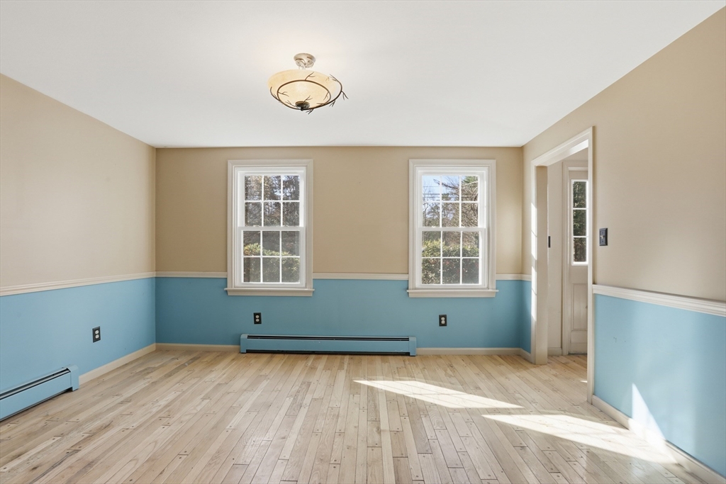 254 Ash Swamp Road Newmarket, NH 03857 - Photo 6 of 30 a view of an empty room with a window