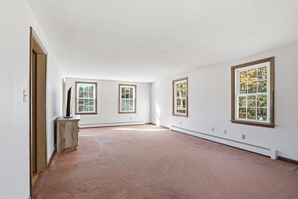 254 Ash Swamp Road Newmarket, NH 03857 - Photo 10 of 30 a view of an empty room with a window