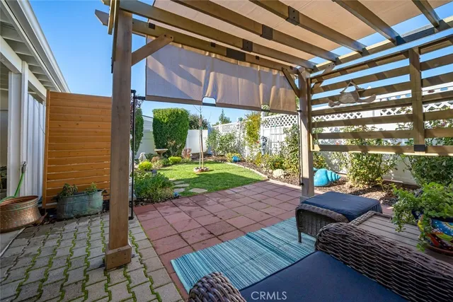 a view of yard with patio