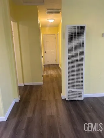 a view of livingroom with wooden floor