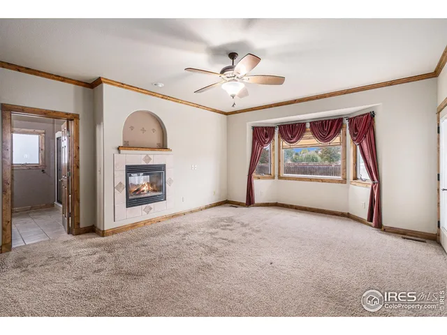 a bathroom with a sink toilet a mirror and shower