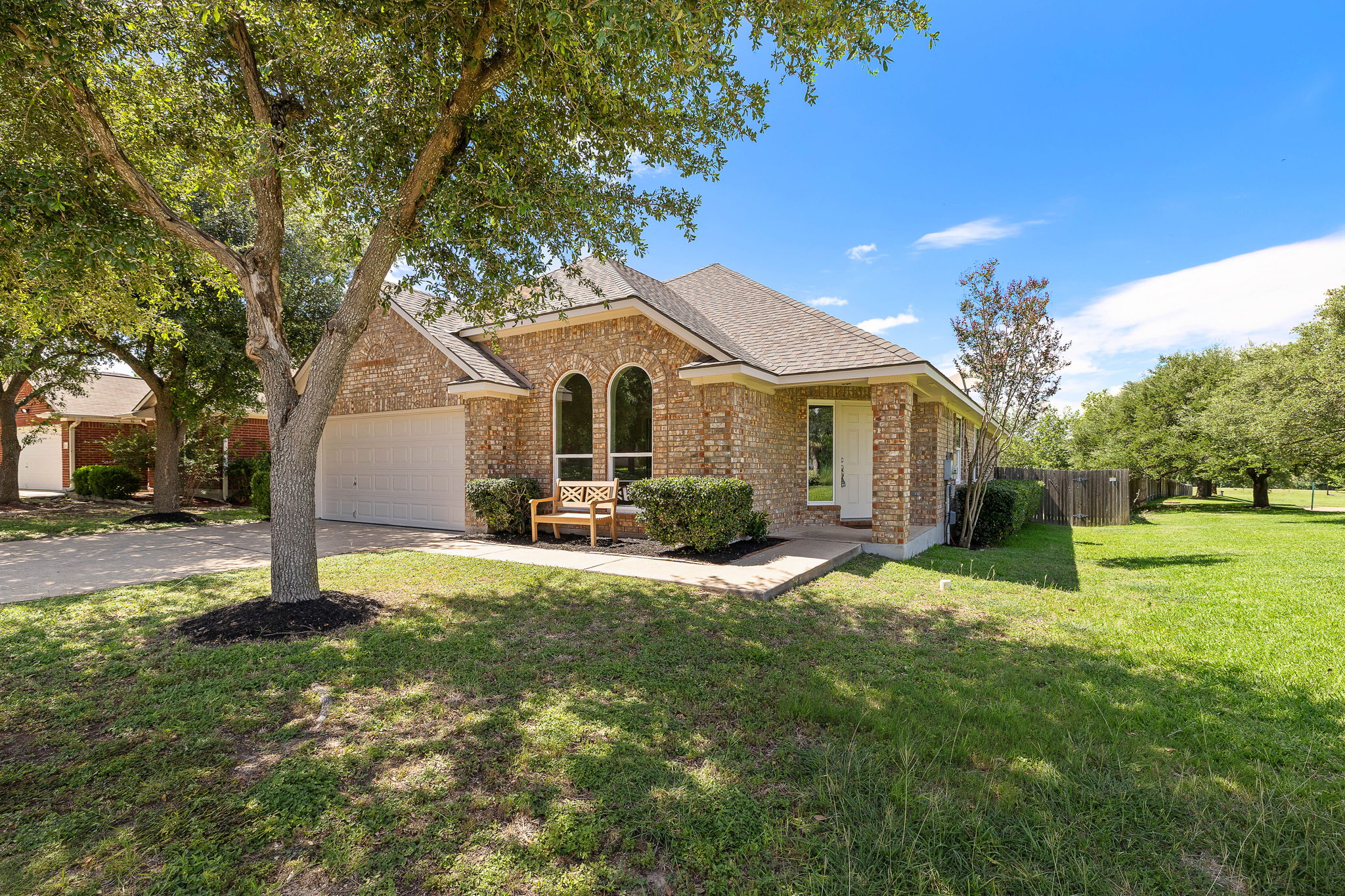 1100 Springbrook Road Pflugerville, TX 78660 - Photo 3 of 23 A classic brick exterior with arched windows welcomes you home.