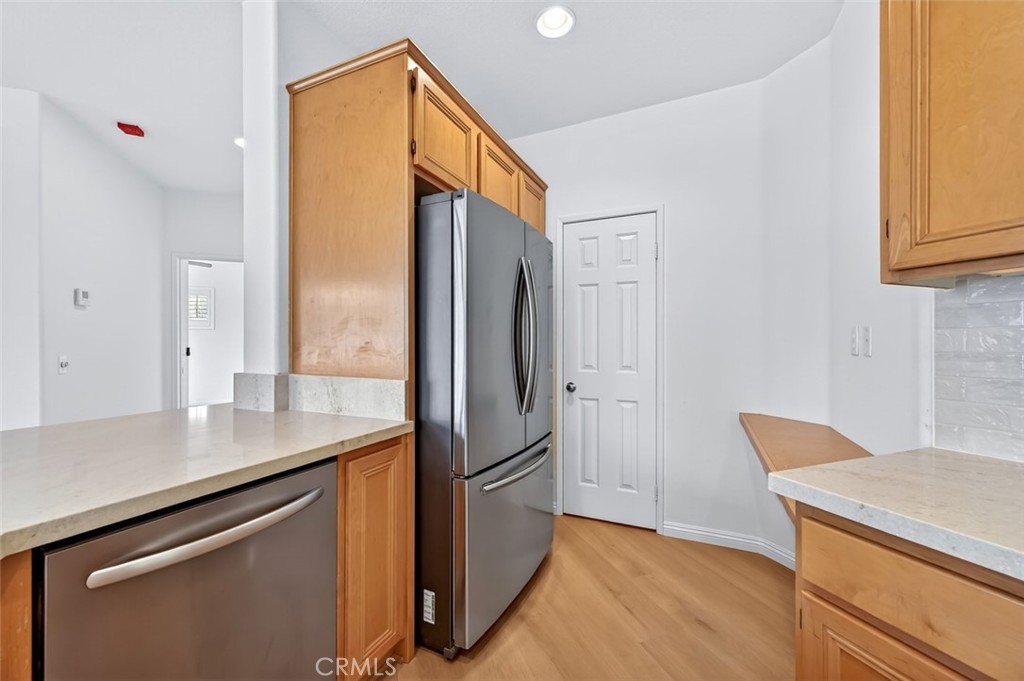 447 Ridgeway Irvine, CA 92620 - Photo 68 of 88 a kitchen with stainless steel appliances a refrigerator and a stove
