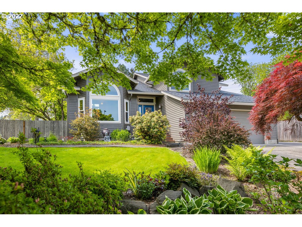 3720 Northeast 160th Street Ridgefield, WA 98642 - Photo 2 of 32 a front view of a house with a yard