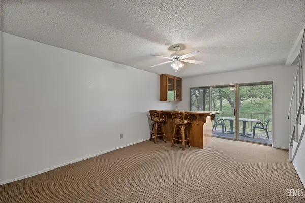 a bathroom with a glass shower door