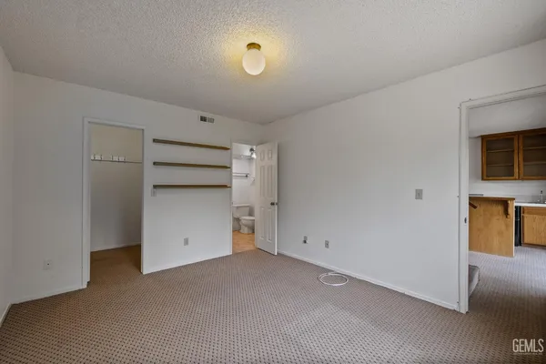 a view of a garden from a balcony