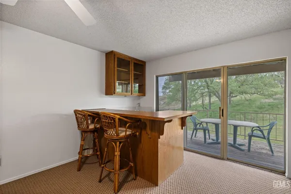 a kitchen with a sink a cabinets and window