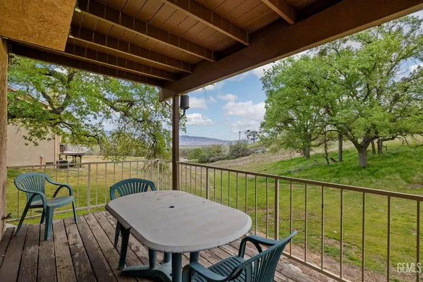 a kitchen that has a sink and a stove in it