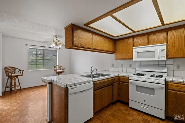 a view of balcony with wooden floor