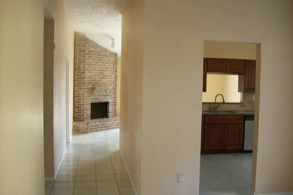 a living room with a fireplace