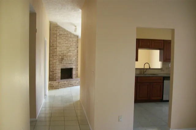 a living room with a fireplace