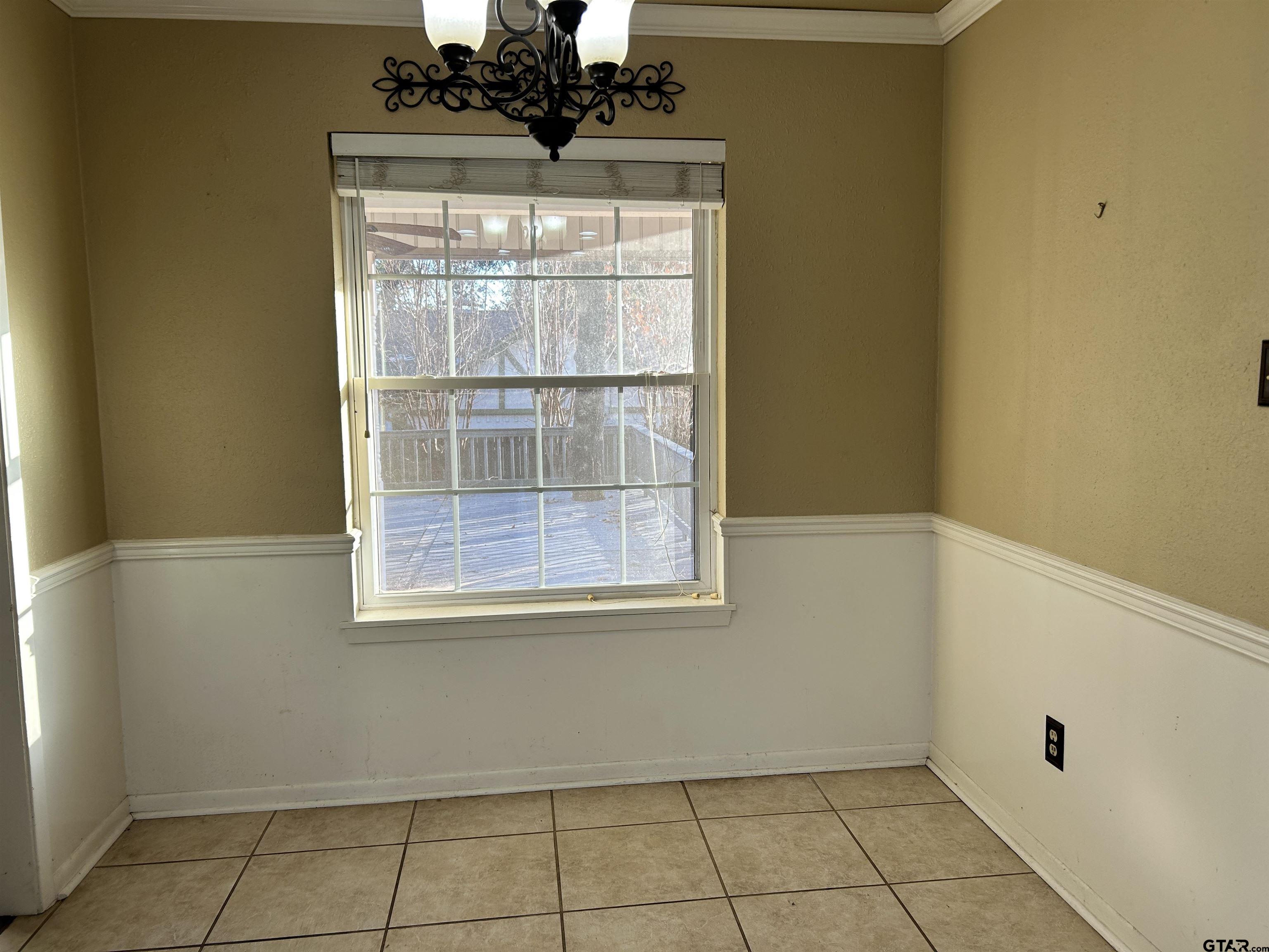 809 David Drive Tyler, TX 75703 - Photo 13 of 18 a view of an empty room with a window