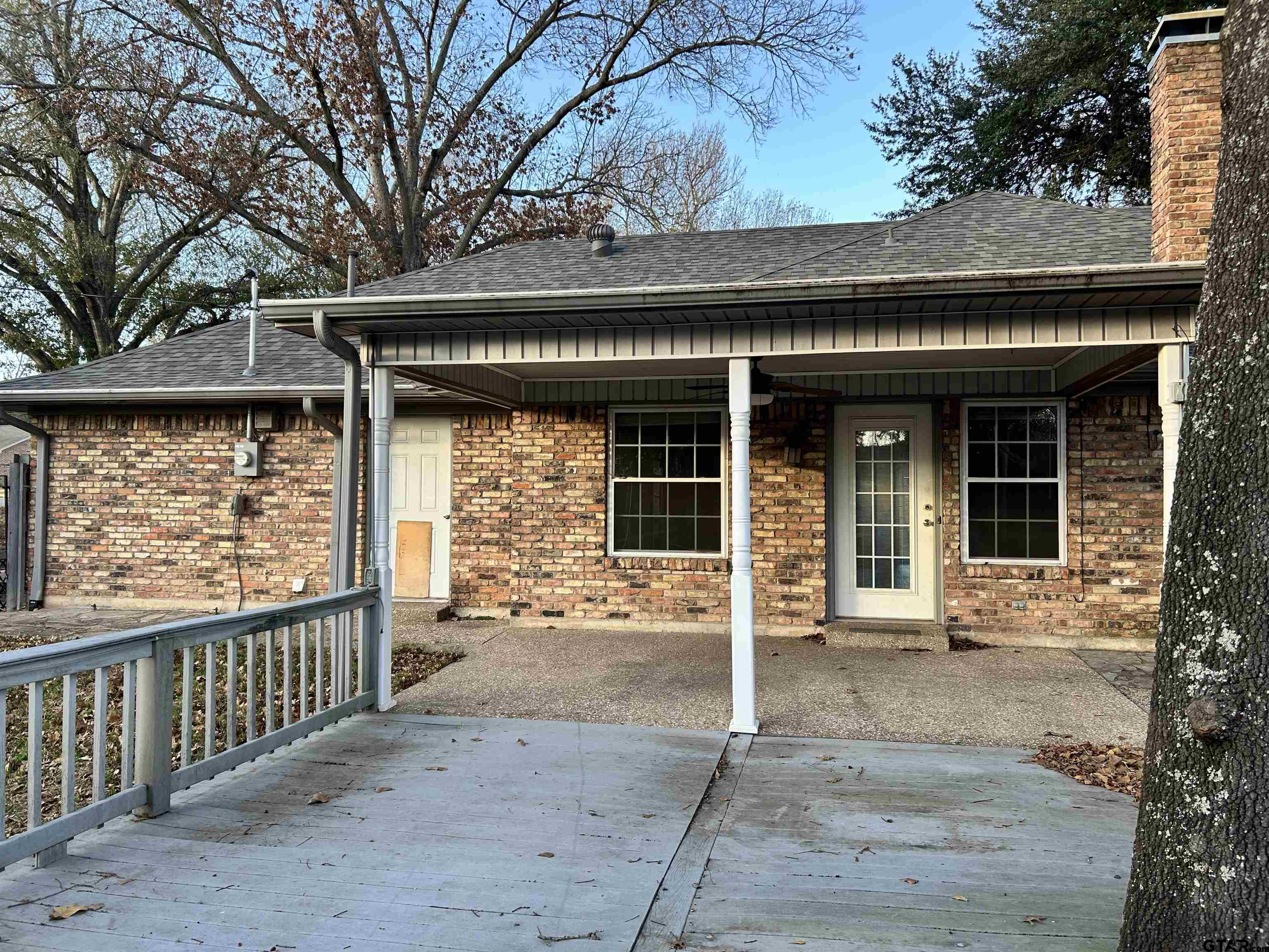 809 David Drive Tyler, TX 75703 - Photo 16 of 18 a front view of a house with a large window