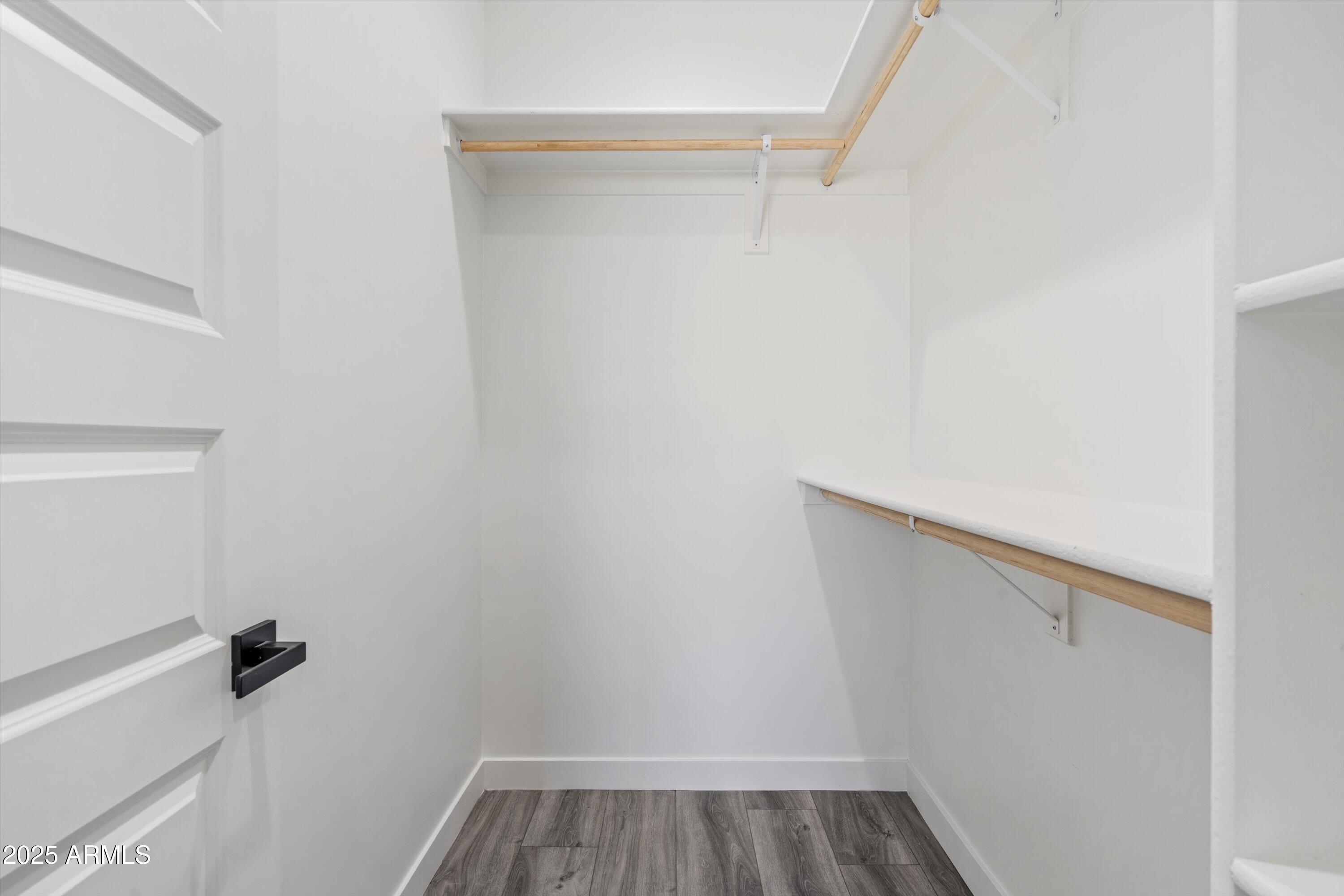 1642 East Monte Vista Road, Unit 1 Phoenix, AZ 85006 - Photo 18 of 34 a view of walk in closet with empty racks