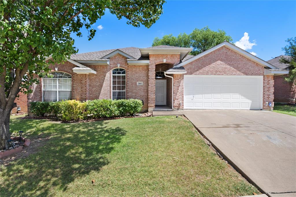 7907 Nighthawk Trail Arlington, TX 76002 - Photo 1 of 1 a front view of a house with a yard and garage