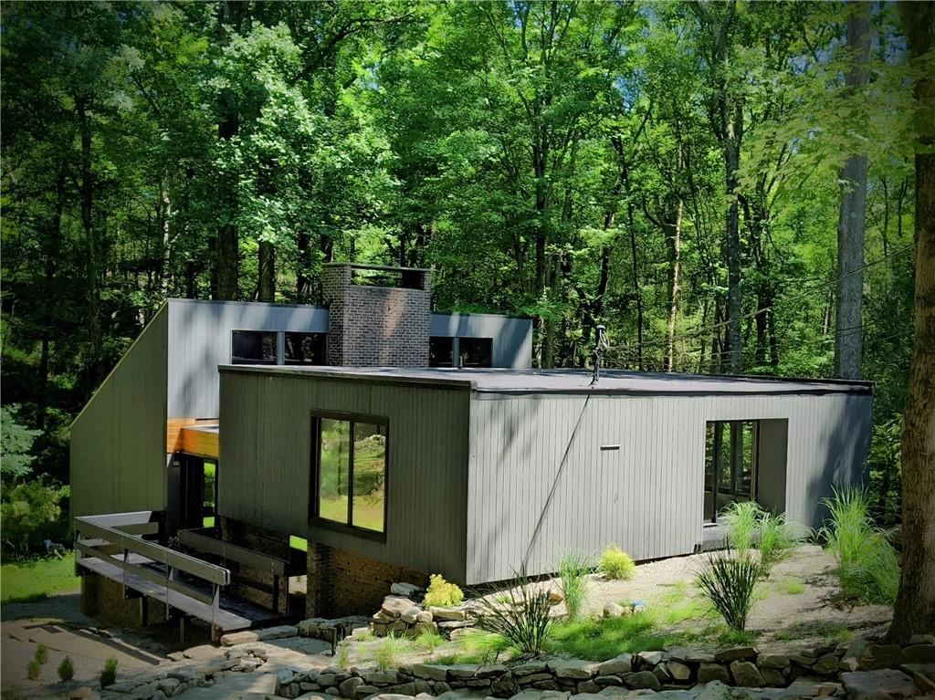 View of home from slate step down path