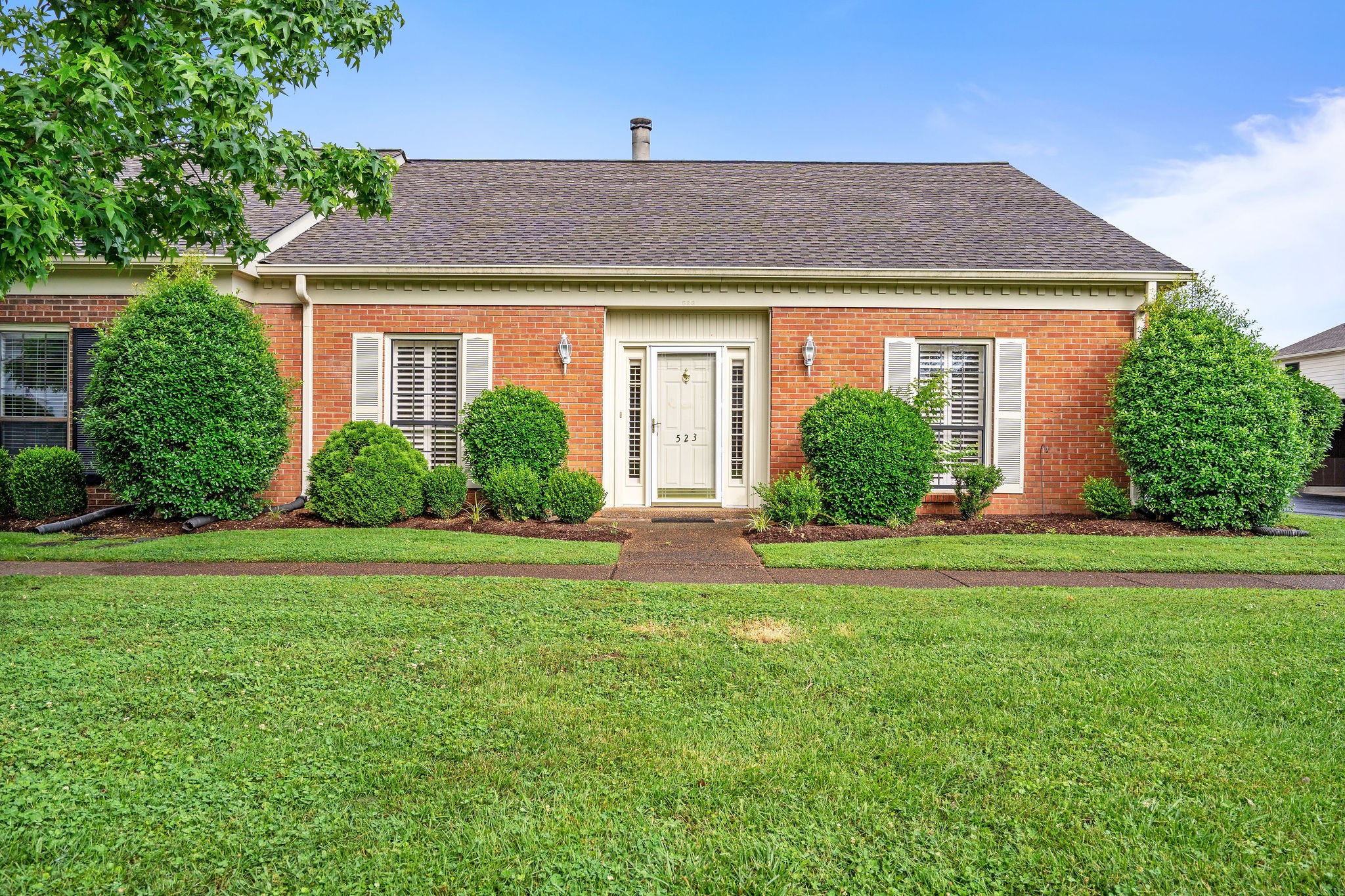 523 General George Patton Road Nashville, TN 37221 - Photo 1 of 30 a front view of a house with a yard