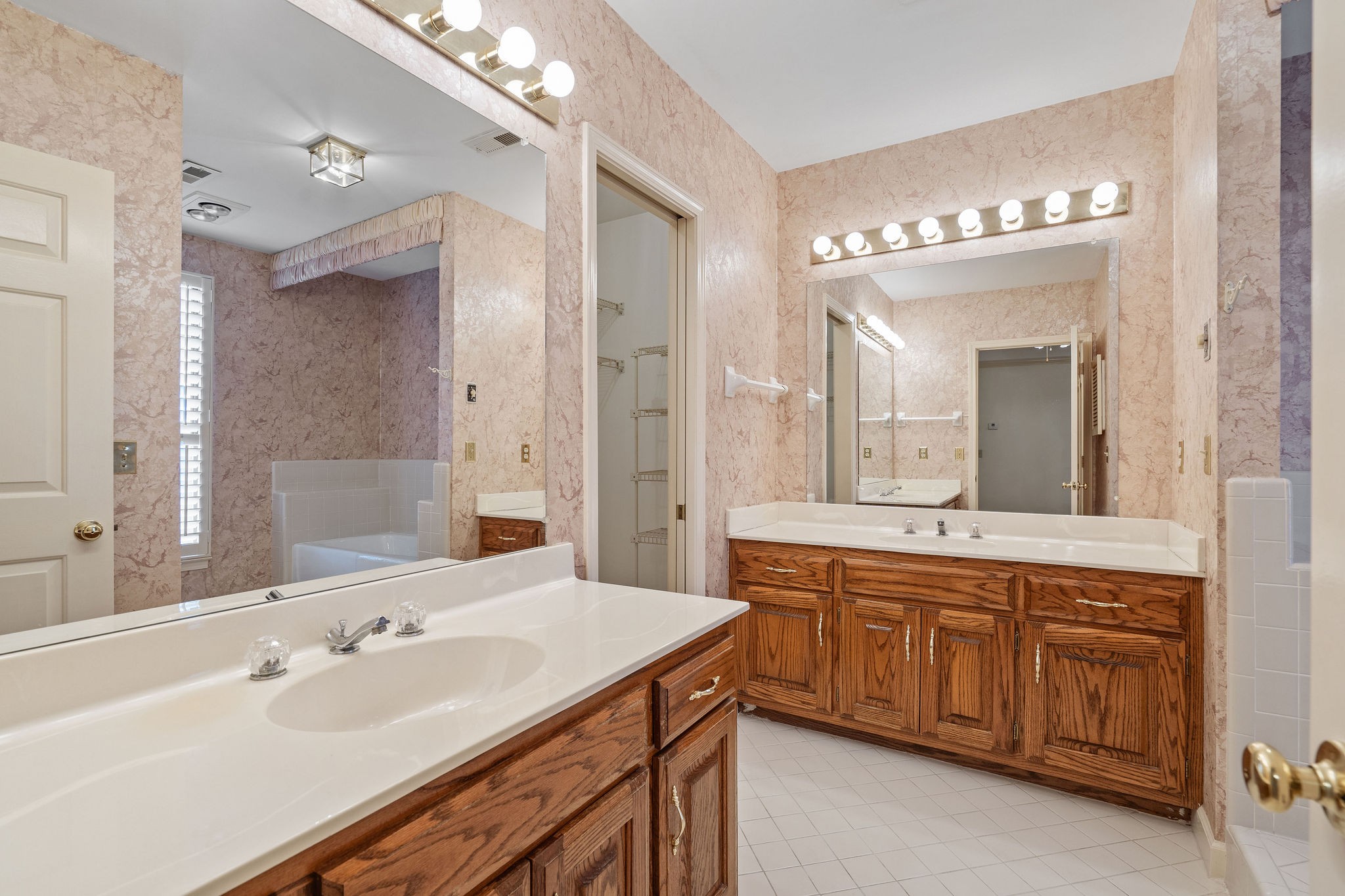 523 General George Patton Road Nashville, TN 37221 - Photo 18 of 30 a spacious bathroom with a sink double vanity and a mirror